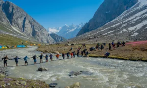 Human chain crossing river